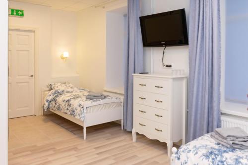 Postel nebo postele na pokoji v ubytování Mia Guesthouse