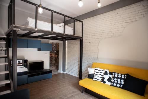 Χώρος καθιστικού στο Apartament Antresola Drzewna