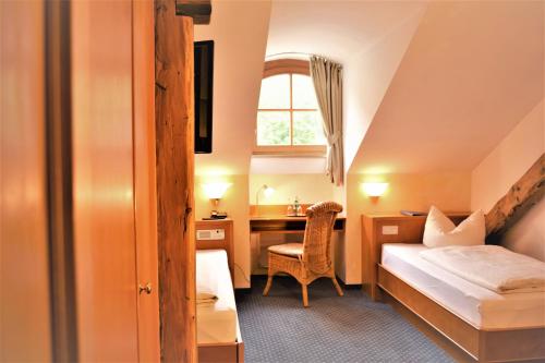 Postel nebo postele na pokoji v ubytování Hotel zum Bräu