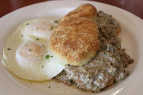 a plate of breakfast food with eggs and meat at Resort at Port Ludlow in Port Ludlow