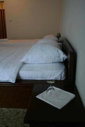 Ένα ή περισσότερα κρεβάτια σε δωμάτιο στο Motel Maksumić