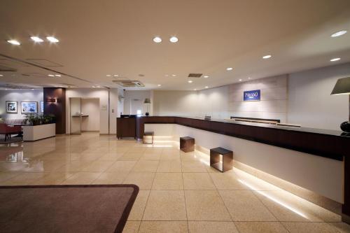 a lobby of a hospital with a waiting room at Keio Presso Inn Shinjuku in Tokyo