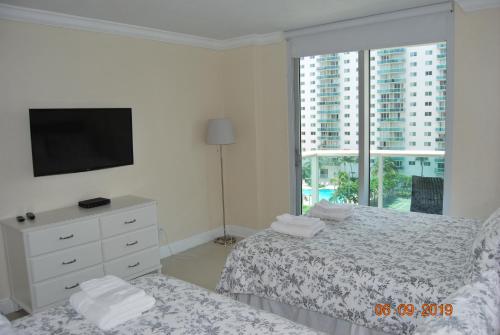 A bed or beds in a room at Ocean Reserve Piso 7 STR-310