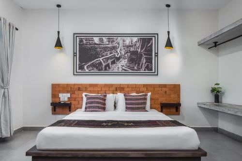 מיטה או מיטות בחדר ב-Green Stay Village