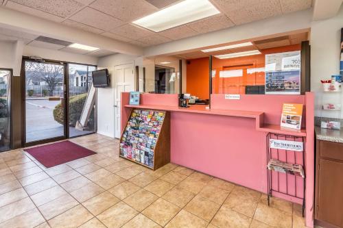 a store with a pink counter in a room at Motel 6-Arlington, TX - UTA in Arlington