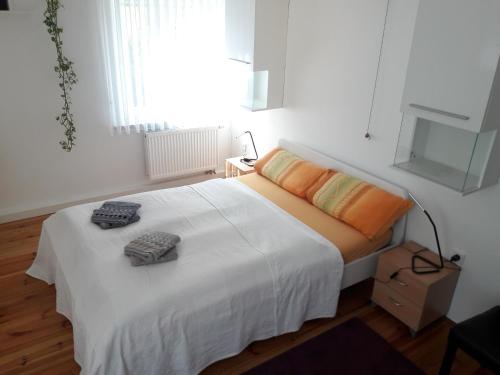 Postel nebo postele na pokoji v ubytování Ferienwohnung Lerchennest