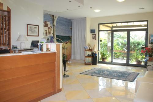a lobby of a house with a reception desk at Hotel Lido in Vasto
