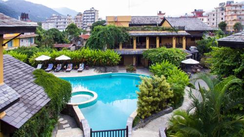 an aerial view of a resort with a swimming pool at Temple Tree Resort & Spa, Pokhara in Pokhara