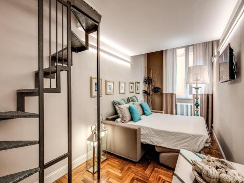 Postel nebo postele na pokoji v ubytování Residenza Paola - 2BR Trastevere
