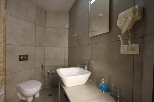 Un baño de Apart-hotel TARHUN