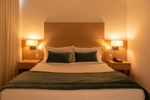 Postel nebo postele na pokoji v ubytování Américas Barra Hotel