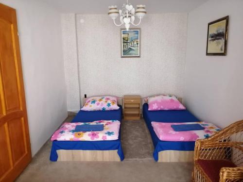 Cama o camas de una habitación en Mandula Apartman