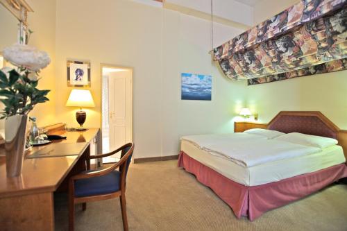 Katil atau katil-katil dalam bilik di Hotel Viktoria
