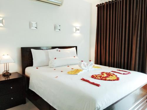 Una cama o camas en una habitación de Jos & Hanny Homestay