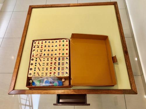 a box with a calendar in it on a shelf at Sakura 1 Homestay Kampar Landed in Kampar