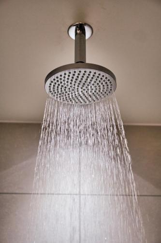 a shower head hanging from a ceiling at Llanerch Vineyard Hotel in Hensol