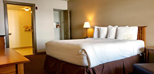 Postel nebo postele na pokoji v ubytování Berlin Heritage Inn