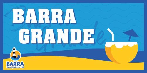 a glass of beer on the beach with the text baraja grande at Hostel Barra in Salvador