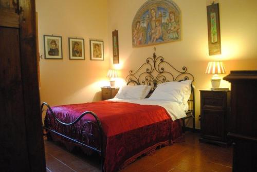 Ein Bett oder Betten in einem Zimmer der Unterkunft Villa Le Casaline