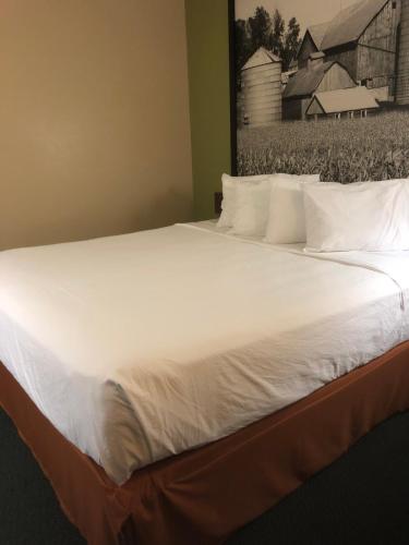Ένα ή περισσότερα κρεβάτια σε δωμάτιο στο Americas Best Value Inn Onawa