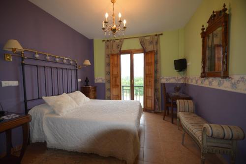 Posteľ alebo postele v izbe v ubytovaní Hotel Rural Remanso