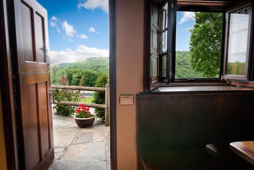 Balkoni atau teres di Apartamentos Rurales Casa Riveras