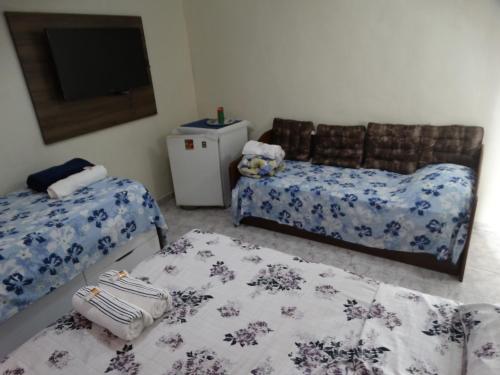 Cama o camas de una habitación en Pousada do Nei