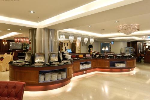 a store with a counter in a mall at Hotel Sunshine in Kaohsiung