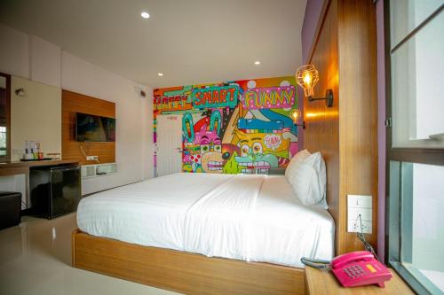 Postel nebo postele na pokoji v ubytování Smart Hotel