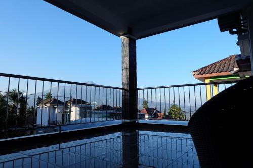 Un balcón o terraza de Green Apple Villa
