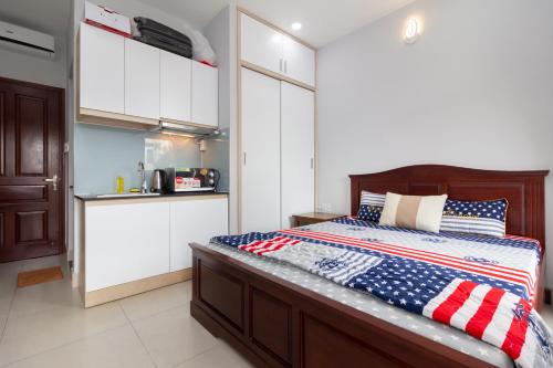 Postel nebo postele na pokoji v ubytování GEM Apartment
