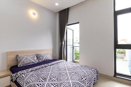 Postel nebo postele na pokoji v ubytování GEM Apartment