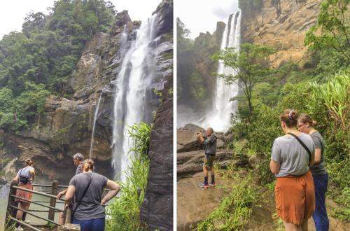 a group of people standing in front of a waterfall at Heaven Hills Guest House in Maskeliya