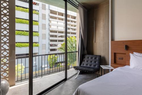 Postel nebo postele na pokoji v ubytování Reno hotel