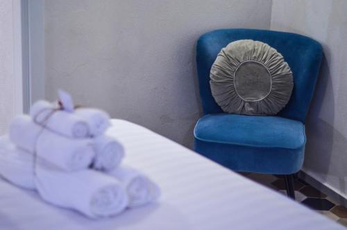 Postel nebo postele na pokoji v ubytování Vicoli di Napoli B&B
