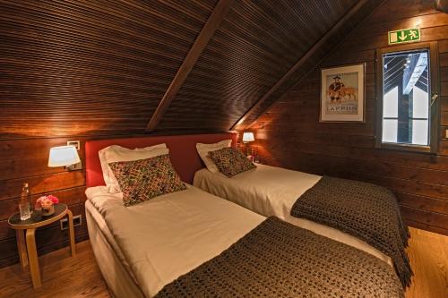 Postel nebo postele na pokoji v ubytování Levi Spirit Luxury Villas & Resort