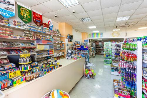 a store aisle with a lot of toys and other items at Rhodos Horizon Blu-Adults Only in Rhodes Town