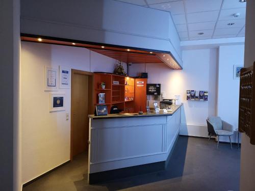 Příslušenství pro přípravu čaje a kávy v ubytování Hotel Zur Alten Druckerei