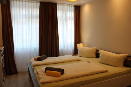 Säng eller sängar i ett rum på Apartment Central Nähe Thomaskirche