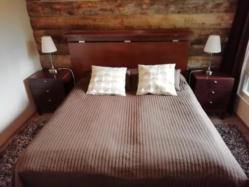 Postel nebo postele na pokoji v ubytování Villa Timantti