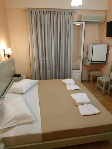 Cama o camas de una habitación en Haravgi Hotel