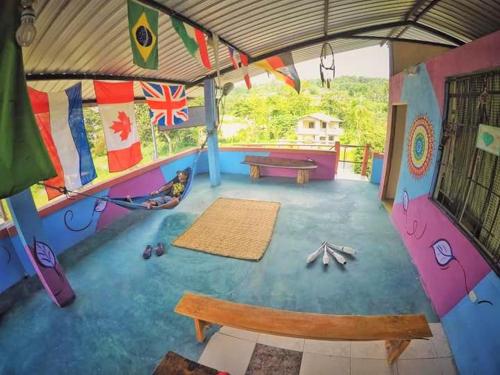 a play room with a bench and a hammock at Zumag Sisa in Tena