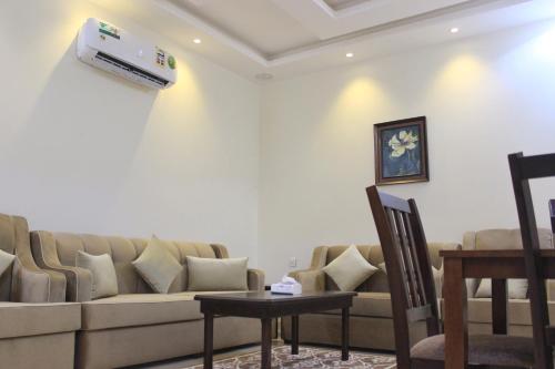 Ruang duduk di Dar Al Jood Hotel units