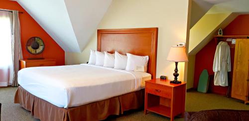 Postel nebo postele na pokoji v ubytování Berlin Heritage Inn