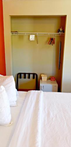 Postel nebo postele na pokoji v ubytování Berlin Heritage Inn
