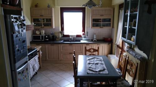 A kitchen or kitchenette at Residenza Montevile di Spaccini Gabriella