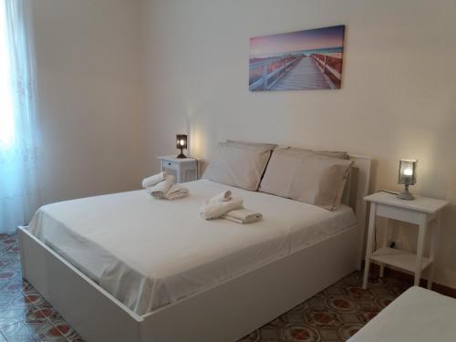 Posteľ alebo postele v izbe v ubytovaní B&B La Veranda