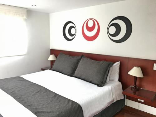 Cama o camas de una habitación en Cora 96 Street Apartments