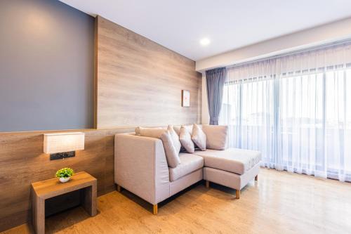 Гостиная зона в Icon Park Hotel, Chiang Mai- SHA Extra Plus