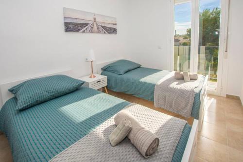 En eller flere senge i et værelse på HAVANA